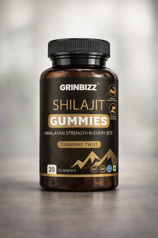 Grinbizz Shilajit Gummies bottle on a gray background