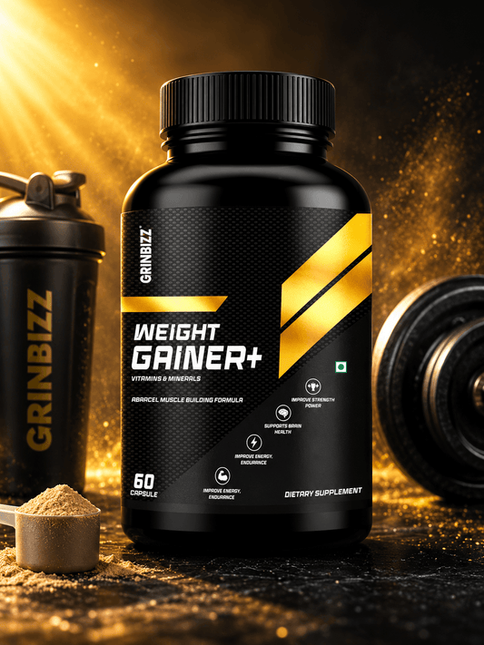 Grinbizz Weight Gainer+ supplement bottle with gym equipment on a dark background