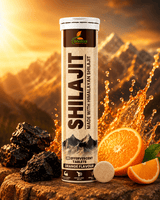Shilajit product with oranges and mountains in the background